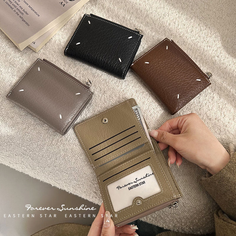 Portefeuilles pour femmes et hommes et style en cuir authentique au toucher tactile