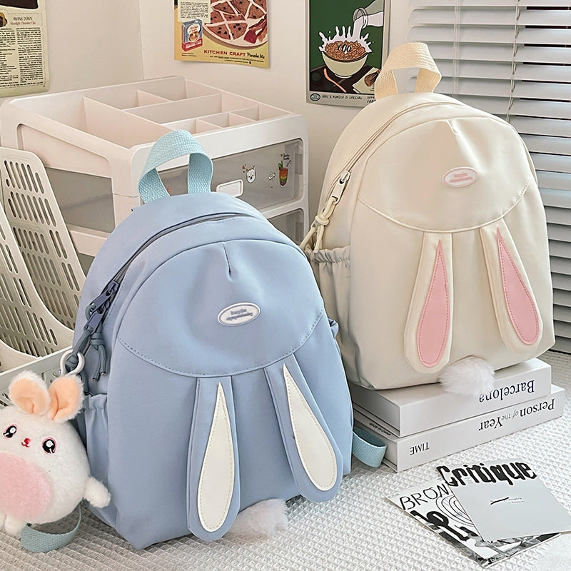 Lapin mignon petit sac à dos de dessin animé d'université féminine