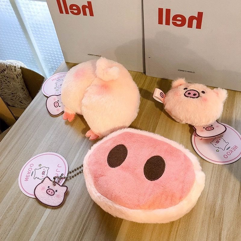 Porte-monnaie chic en peluche avec tête de cochon et cœur