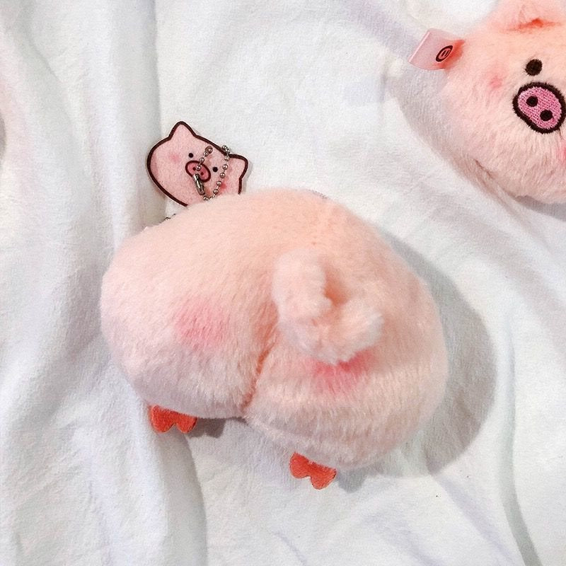 Porte-monnaie chic en peluche avec tête de cochon et cœur