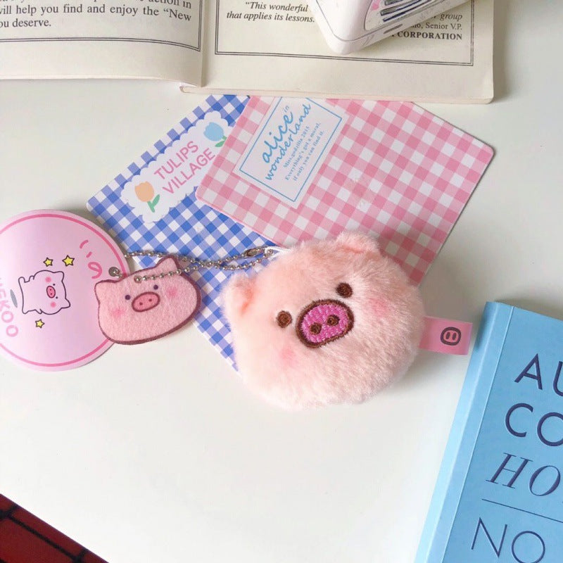 Porte-monnaie innovant en peluche avec tête de cochon et cœur