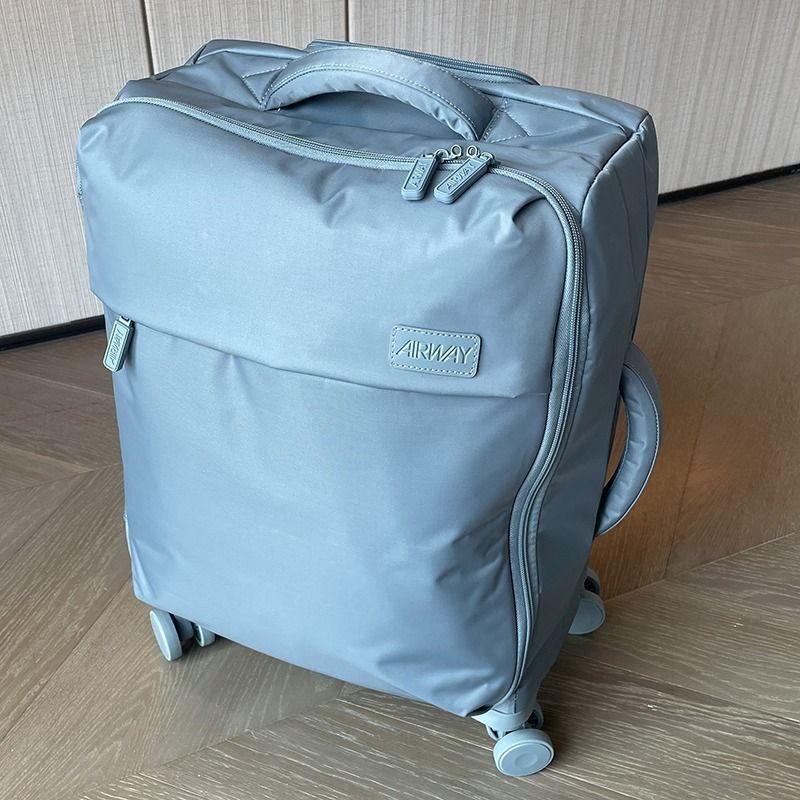 Casual Oxford Cloth Suitcase Password Waterproof Universal Wheel