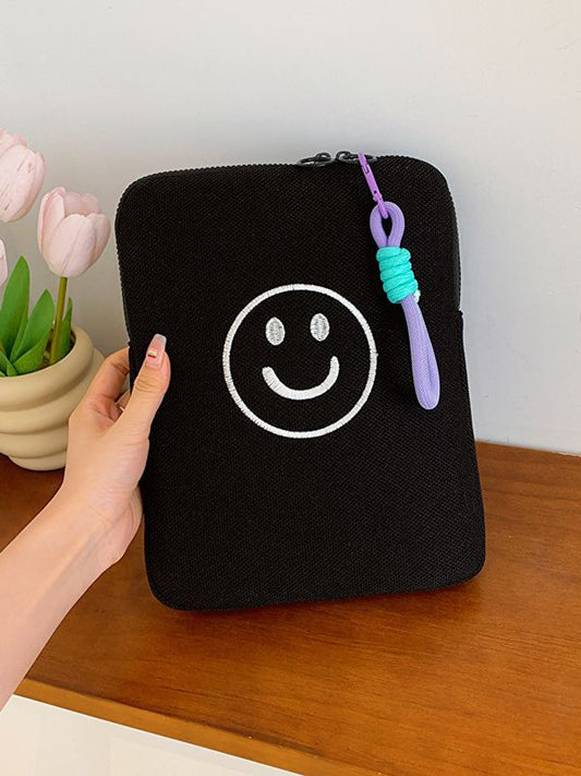 Rangement mignon pour visage souriant adapté aux sacs pour tablettes