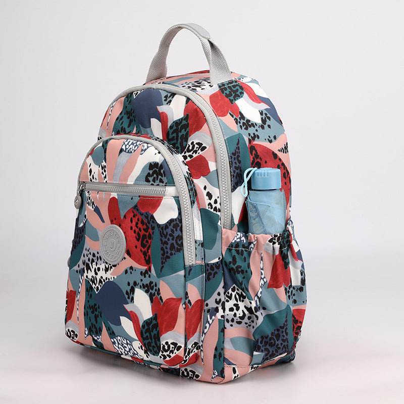 Sacs à dos en tissu de fleurs en nylon élégant et cool pour femmes